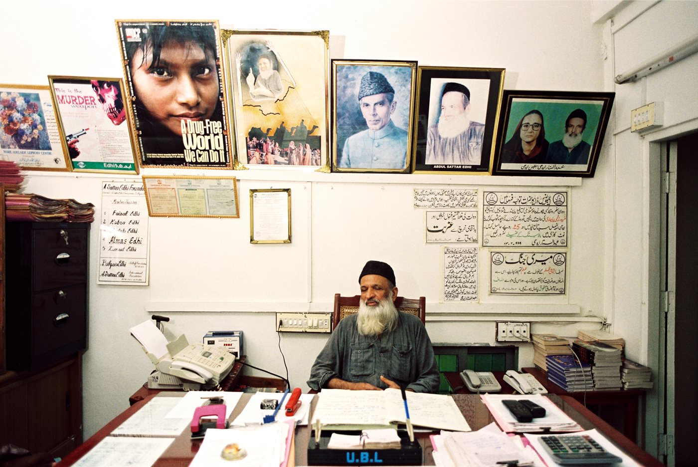 Abdul Sattar Edhi sits at his desk in the Mithadar district of Karachi. His office is the same building where, in 1951, he opened his first free pharmacy, and he remains personally on call: &quot;I am always available to all,&quot; he said.