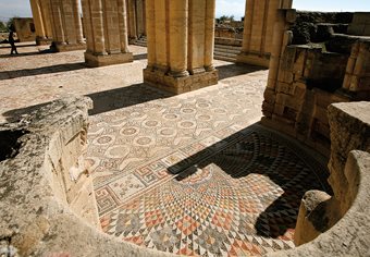 <p>This wider view of Apse <span class="smallcaps">v</span> shows its relationship to the axial nave, top left. Its original back wall would have been much higher and surmounted, like the others, with a half dome.</p>
