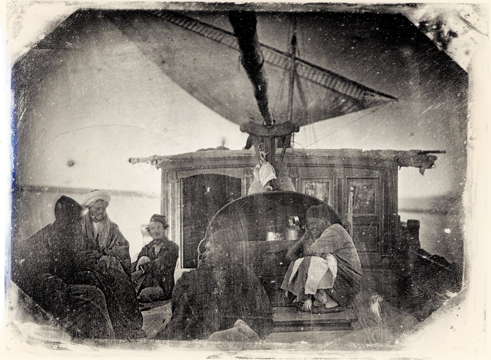 Also following in the footsteps of Vernet and Goupil-Fesquet was Alphonse-Eugène-Jules Itier, another daguerreotypist who traveled to document world treasures in the early 1840s. While he was working for the French Customs Service, his travels took him to Africa, the West Indies, China, the Pacific Islands, Borneo, Manila&mdash;and Egypt, where in 1845 or 1846 he exposed this unusually candid image of travelers on the Nile in a sailing boat.