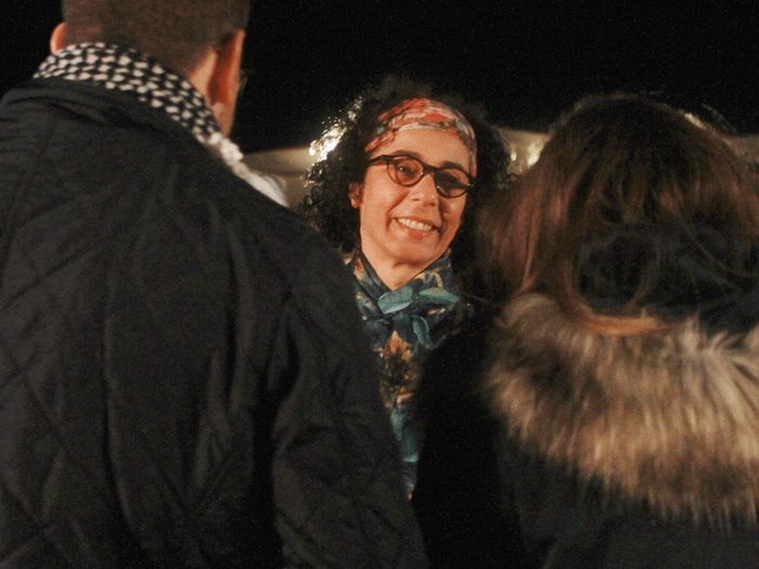 <em>Top:</em> Bedouin actors greet each other at the screening of <em>Theeb</em> while Toukan, <em>above</em>, greets viewers.&nbsp;