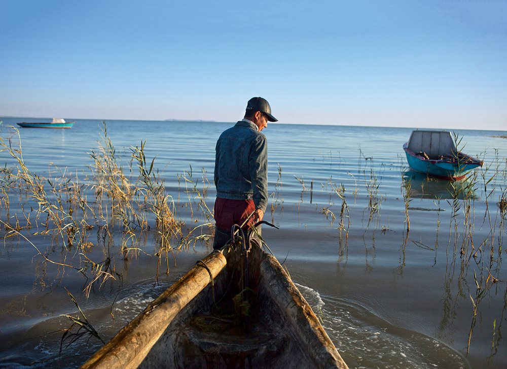 <p>Into the slowly rising waters of the North Aral Sea, a fisherman wades out along a marshy shore that from the 1980s until a few years ago was a dusty desert&rsquo;s edge. This smaller, now separate part of what was once the world&rsquo;s fourth-largest inland sea has increased its water volume by half in a decade.</p>
