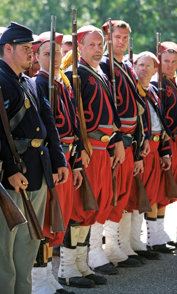 <p>Representing smartly clad Zouaves at a re-enactment battle in 2008 in Huntington Beach, California, Civil War reenactors today help preserve the memory of the Zouave troops who fought on both the Union and Confederate sides.</p>
