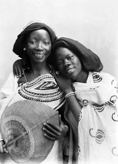 In 1833 Omani Sultan Barghash ibn Said created a <em>camera obscura</em> room in the high tower of his palace, inaugurating a tradition of portraiture in Zanzibar that carried through to the early 20th century, when this photo of two unidentified women was made. Their kanga designs testify to the enduring presence and&mdash;because they chose to wear it on the occasion of a portrait&mdash;high social status of kanga in Zanzibar and throughout the coast of East Africa, &ldquo;the Swahili Coast.&rdquo;
