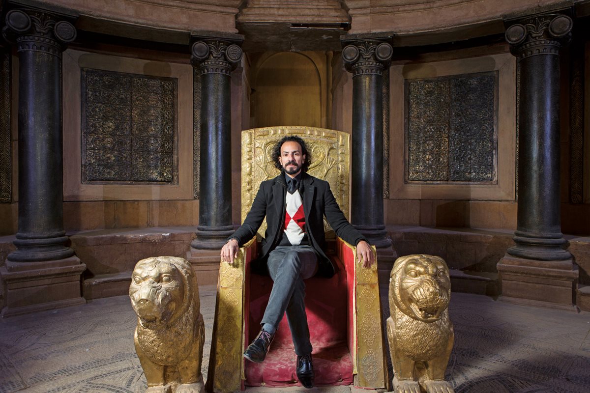 <p>Abderrazzak Zitouny, director of the Ouarzazate Film Commission, takes a center-stage throne on a movie set at the Ouarzazate Cinema Museum. The commission is the second-oldest on the continent after one in South Africa, and it has reeled in several million-dollar productions since it opened in 2008.</p>
