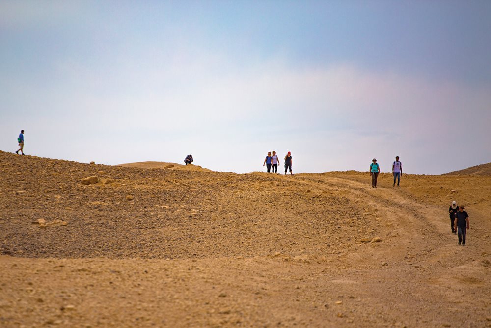 Hikers crest a rocky hill between Hebron and Bethlehem along the Masar Ibrahim, which built on the success in the late 1990s of the Nazareth-to-Bethlehem Nativity Trail, “one of the first ideas linked to mass-market tourism” in Palestine, says developer Raed Saadeh.