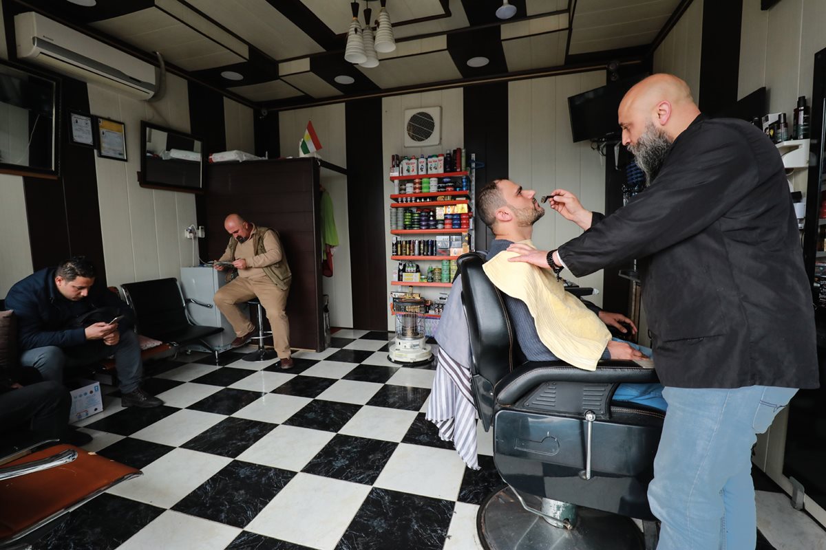 With a population of 4,000, Amedi is alive with shops, restaurants, cafés and neighborhoods. Younis Sadallah Younis has been the town’s barber since 2011. Although he keeps up with sartorial trends, he says most of his customers tend to keep to traditional cuts. 