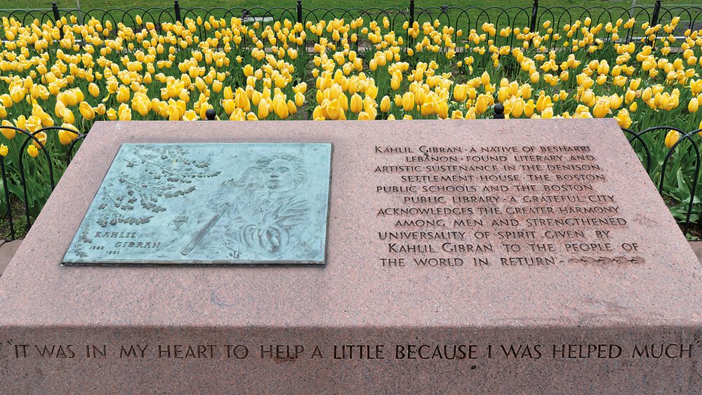 Kahlil Gibran the Prophet - Bronze plaque of Gibran holding a copy of The Prophet.