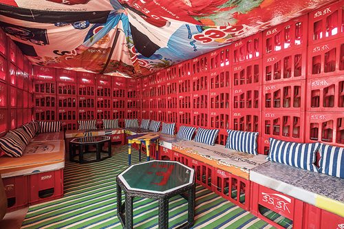 Hassan Hajjaj Full of brilliant colors and objects from custom-made crafts to recycled bottle crates and other “found objects,” Riad Yima in Marrakesh serves as one of Hajjaj’s two retail boutiques as well as a cafe 
and gallery.