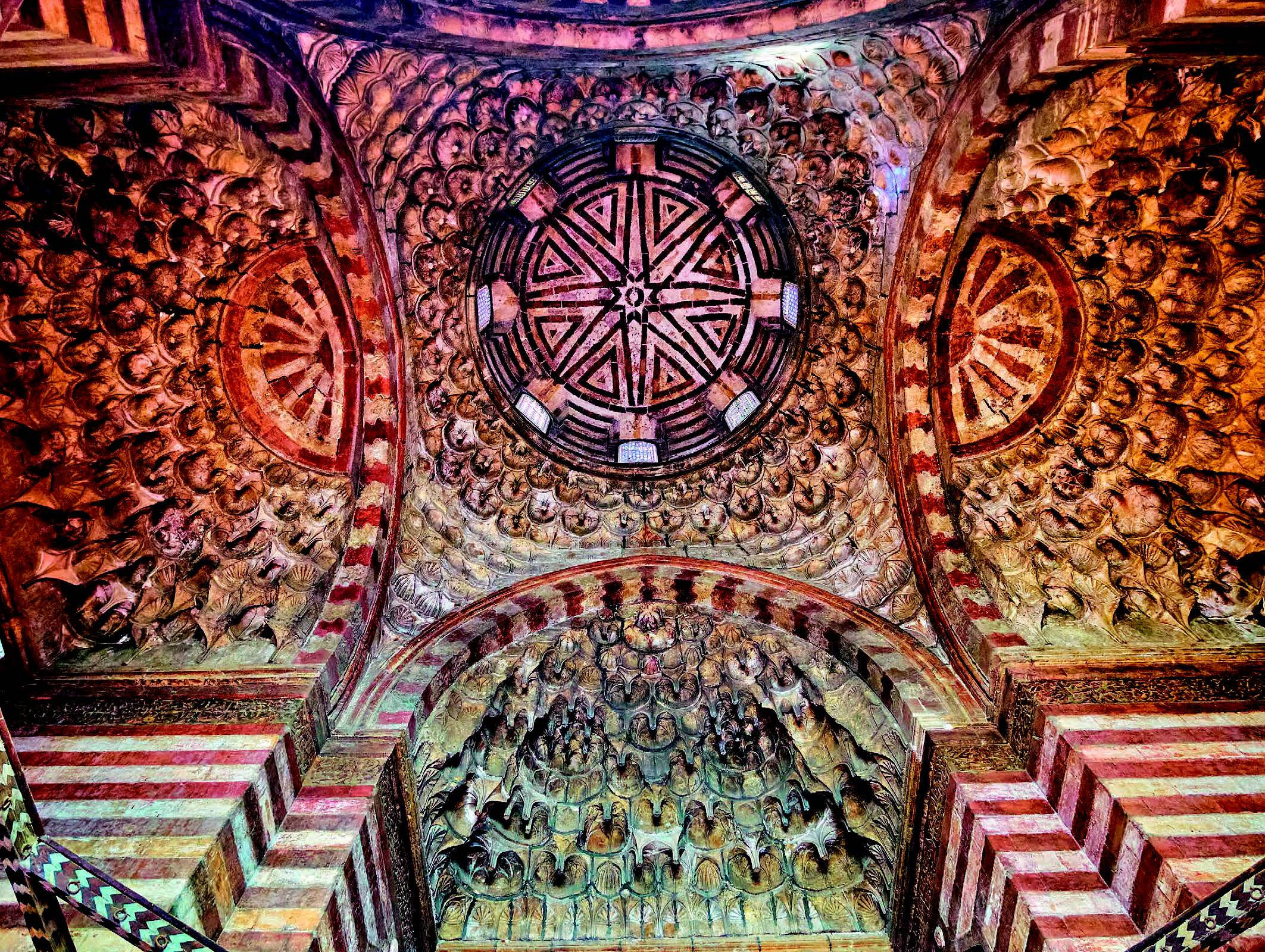 CAIRO, EGYPT: SULTAN HASAN MOSQUE The funerary complex of Sultan Hasan (r. 1356-61 CE) is the largest and most elaborate of those built in Cairo by the Mamluk sultans. The magnificent entrance vestibule is covered by a bicolored stone dome pierced by eight small windows that rests on a ring of stone muqarnas, itself supported by muqarnas pendentives and flanked by muqarnas semidomes.