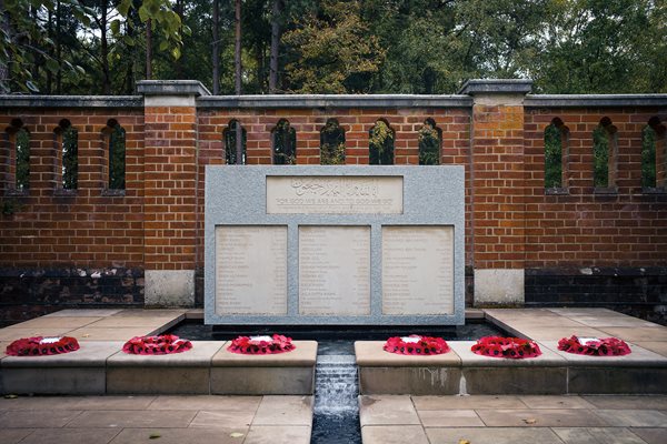 The commemorative plaque is inscribed with the names of the soldiers who were buried here.