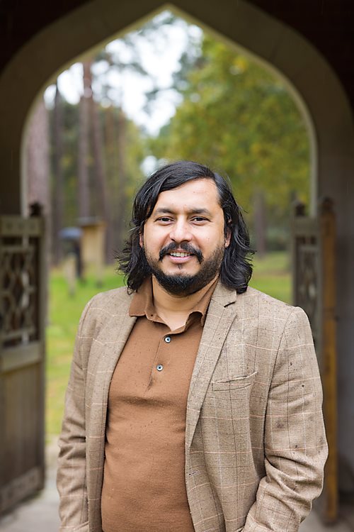 A blue, circular marker identifies the section of Brookwood that is one of the trail’s three stops. Journalist and travel writer Tharik Hussain, <strong>above</strong>, found inspiration for the idea of the trails in the archives of the mosque.