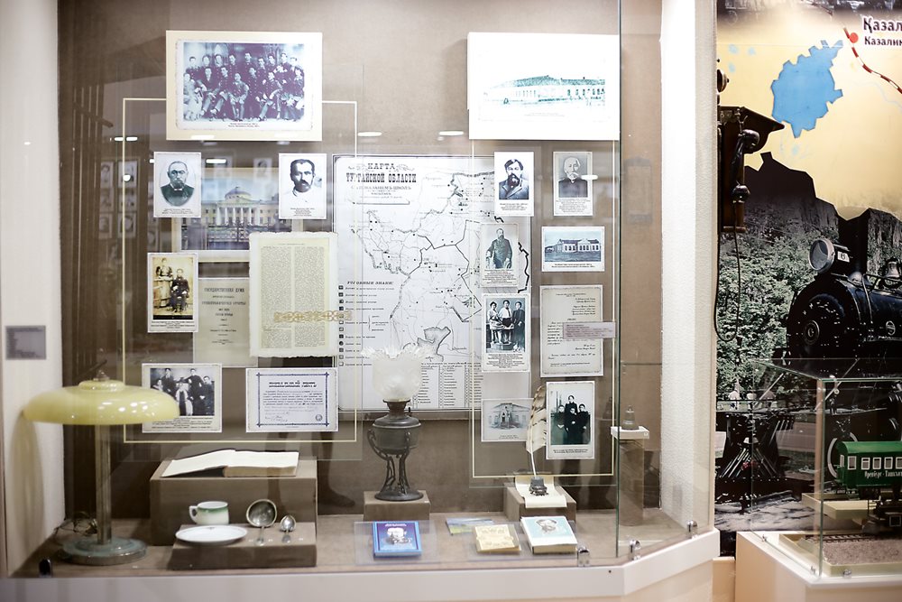 At the Aktobe Regional Museum of History and Local Lore, a display highlights major Kazakh historic figures of the late tsarist and early Soviet periods. The display features the 1913 photo of Doszhanova and her two classmates from the Women’s Gymnasium of Orenburg.