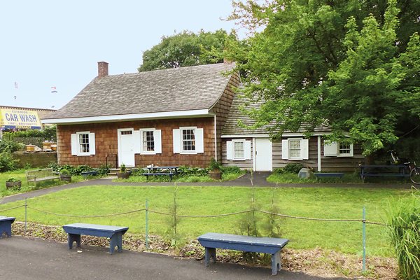 The oldest structure in New York state is the smaller part—to the right—of what is now the Wyckoff Museum and farm in Brooklyn. The 1652 illustration above shows houses of similar design in newly settled Breukelen. 