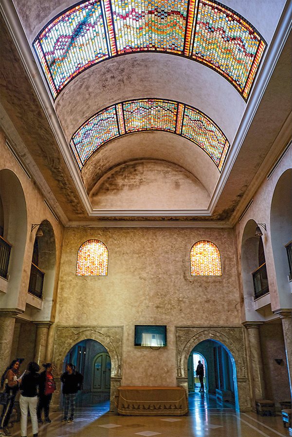 To illuminate this private health spa, Keskes designed ceiling panels of glass tiles.