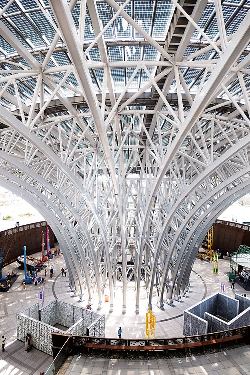 Inside Terra, the roof’s “eye” of sloping, ribbed steel descends to a courtyard and creates a natural vent to let heat rise out of the building.