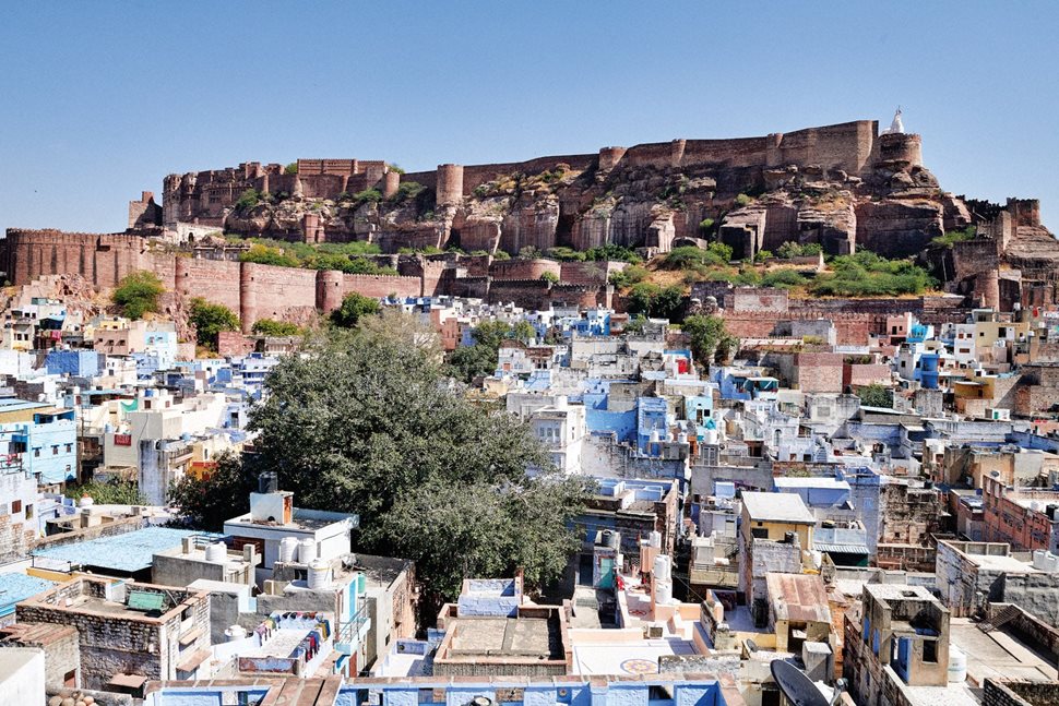 Jodhpur, top and above, known for its iconic blue buildings and the towering Mehrangarh Fort, is a city in northwest Rajasthan located in the Thar Desert some 300 kilometers west of the state capitol of Jaipur. It is also home to the annual Jodhpur Rajasthan International Folk Festival. It’s here where the buzz of 1 million people and the opportunities of the city attract some younger Manganiyar and Langa to leave their communities for work and school. 