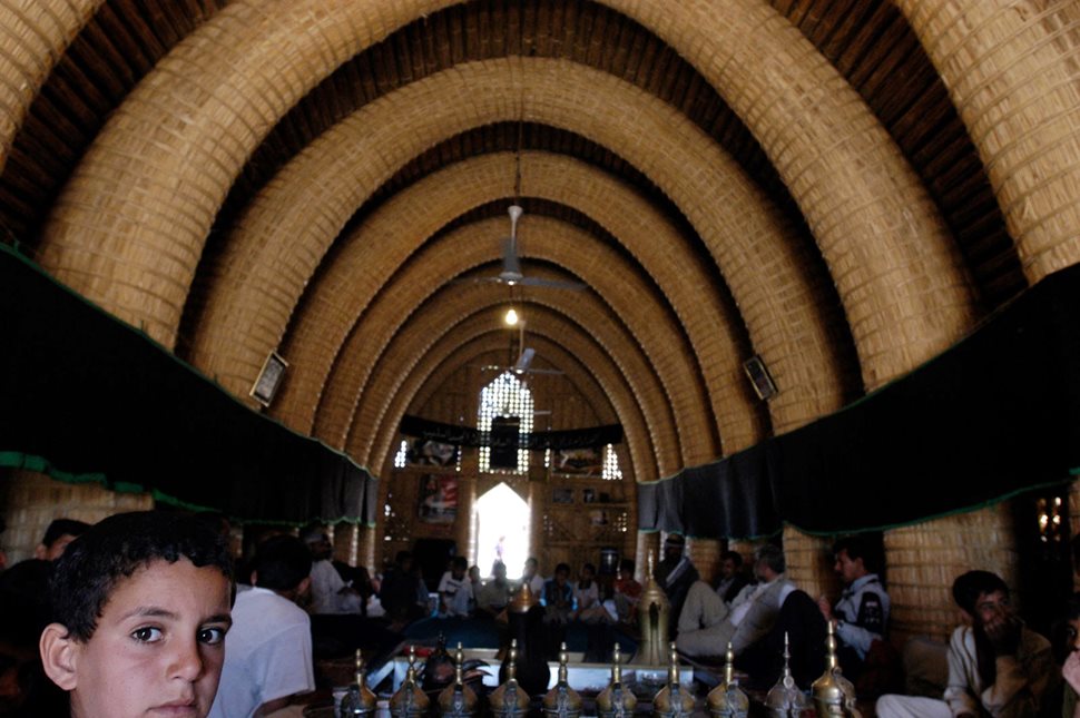 In Chubaish, the “Venice of Iraq,” a grand mudheif, or communal reception hall, has been built. It shows the strong, light, flexible arches of bundled reeds that are the most striking feature of the once common traditional architecture of the marsh tribes.