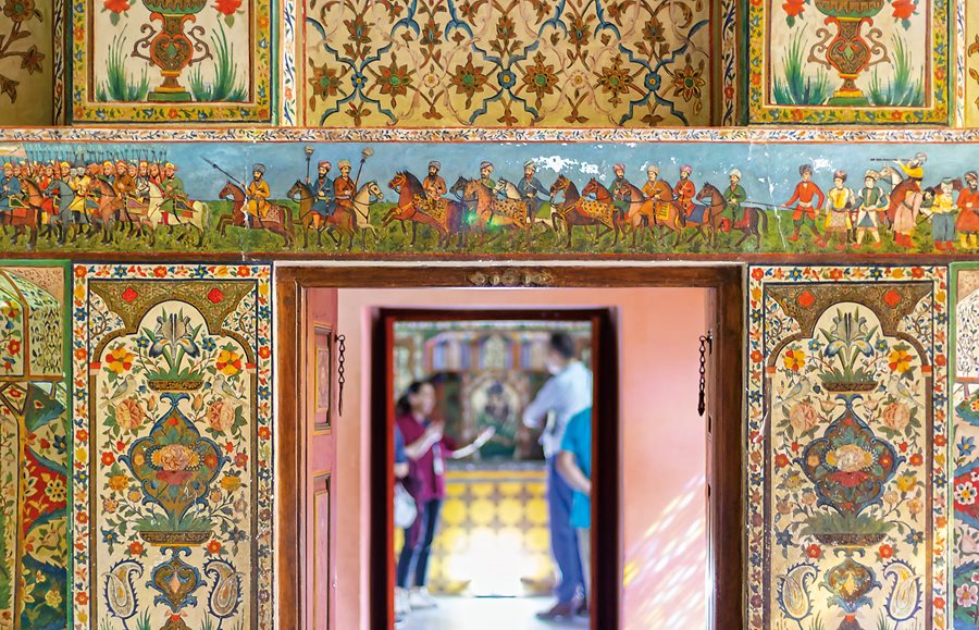 In Shaki’s 18th-century Palace of Khans, Mammad Ahmadov, director, and Zamina Rasulova, guide and author, point out the prominence of the Karabakh horse throughout frescos by architect and master painter Abbas Qulu. These include the hunting scene, above, whose full length depicts some 140 horses as well as people whose variety reflect the region’s historic role as a nexus of trade and powers.