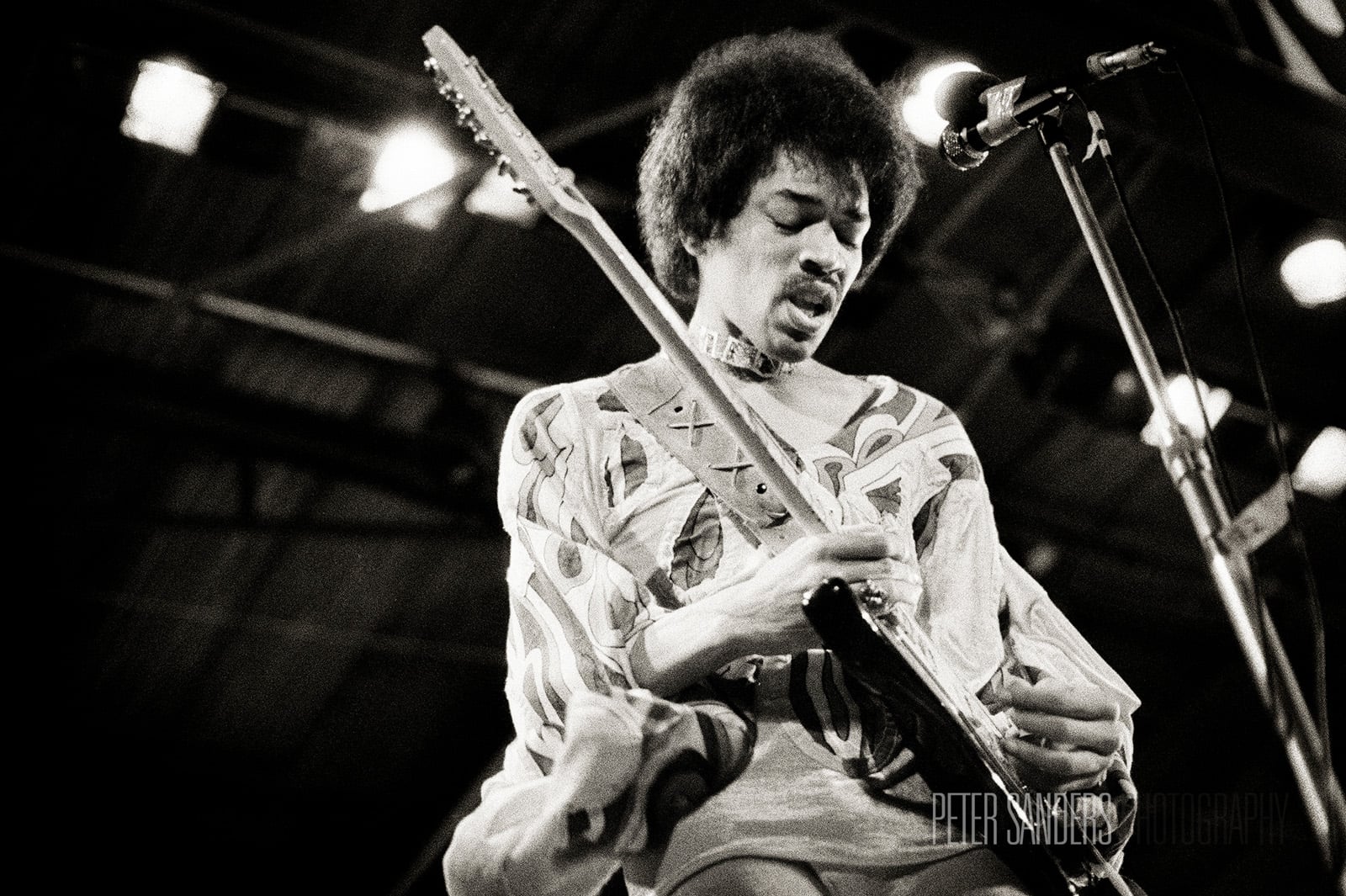 Peter Sanders began his career photographing music icons. He shot the Isle of Wight festival performances of Jimi Hendrix, left, in 1970 and Bob Dylan, right, in 1969.