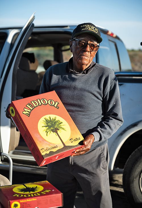 Ninety-three-year-old Julian Delgadillo sells Medjool dates from his truck in Mecca. 