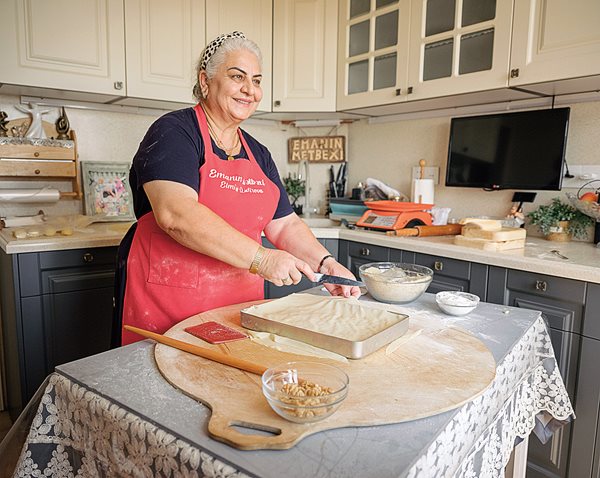 Social media star Elmira Gadirova cooks bakı paxlavası (Baku-style baklava) in her apartment in the capital city, Baku.