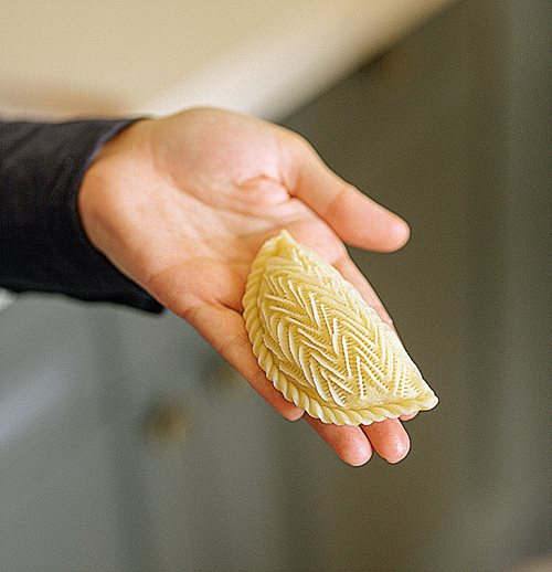 Elmira Gadirova’s shekerbura is a perfect accompaniment to a cup of çay. Shaped like moons, the pastries are stuffed with hazelnuts and dusted with sugar. They are an especially popular dessert during holidays like Novruz.