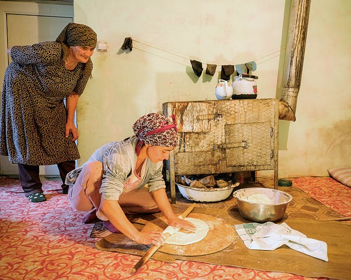 In Yerği-Kek, a small village and one of Azerbaijan’s highest, Liza Shahverdiyeva makes a traditional tskan meat pie as her mother-in-law, Perisultan Shahverdiyev, watches. Seasonal ingredients such as onions, berries and potatoes are mixed with meat, stuffed into dough and then baked in a kharak over an open fire. Each slice is enough to fill tourists walking the 1,500-km (930-mile) Transcaucasian Trail, which passes through the village.